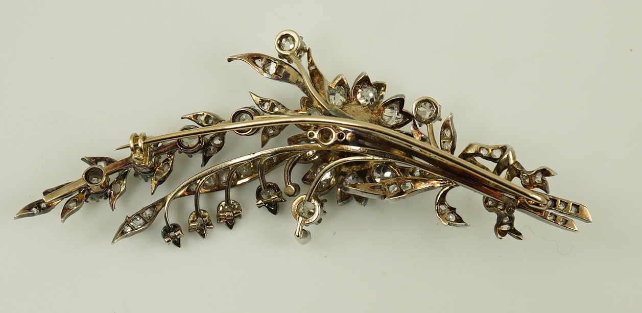 A Victorian gold, silver and diamond cluster foliate spray brooch